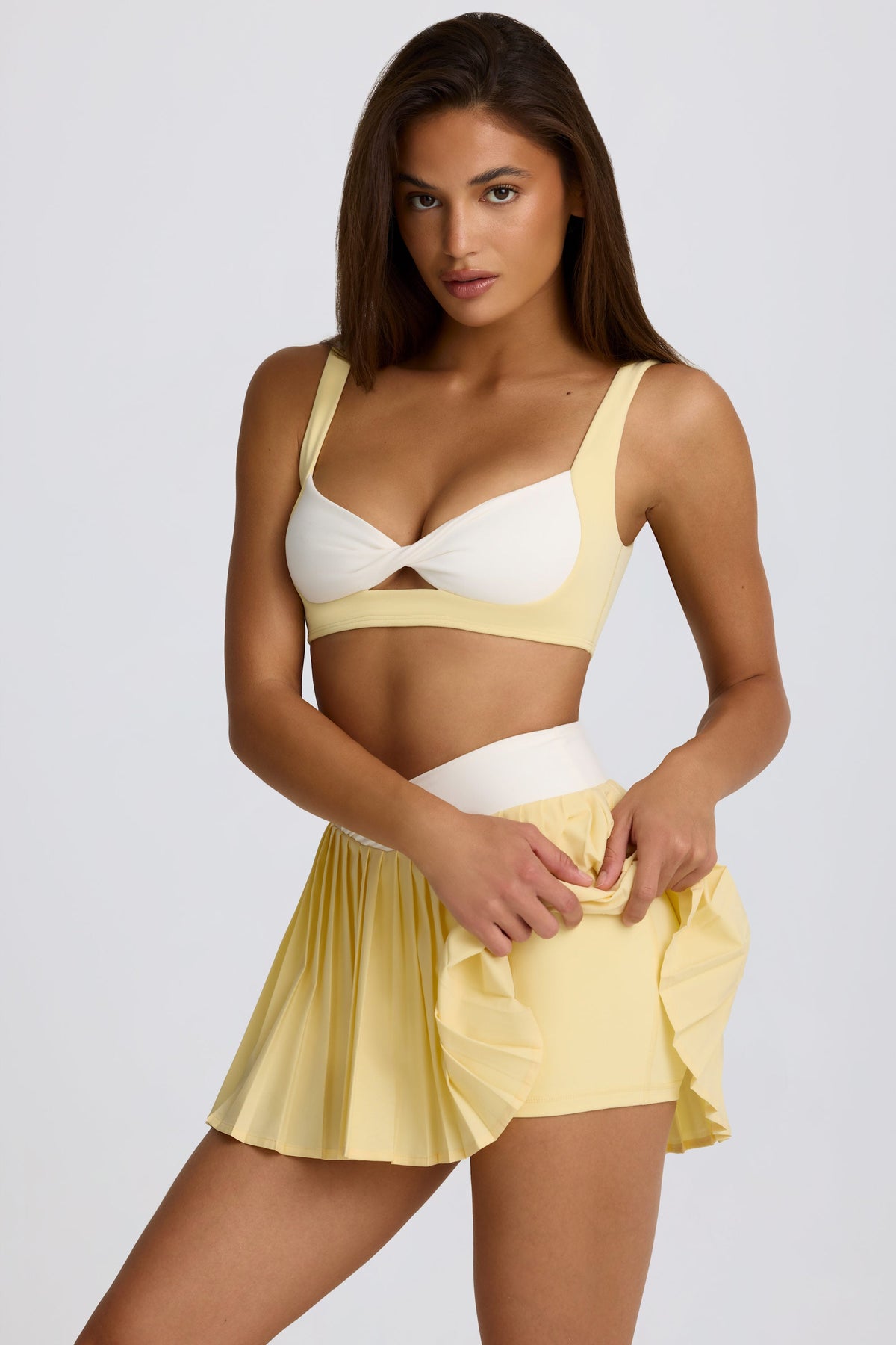 Soft Active Crossover Pleated Mini Skort in Lemon